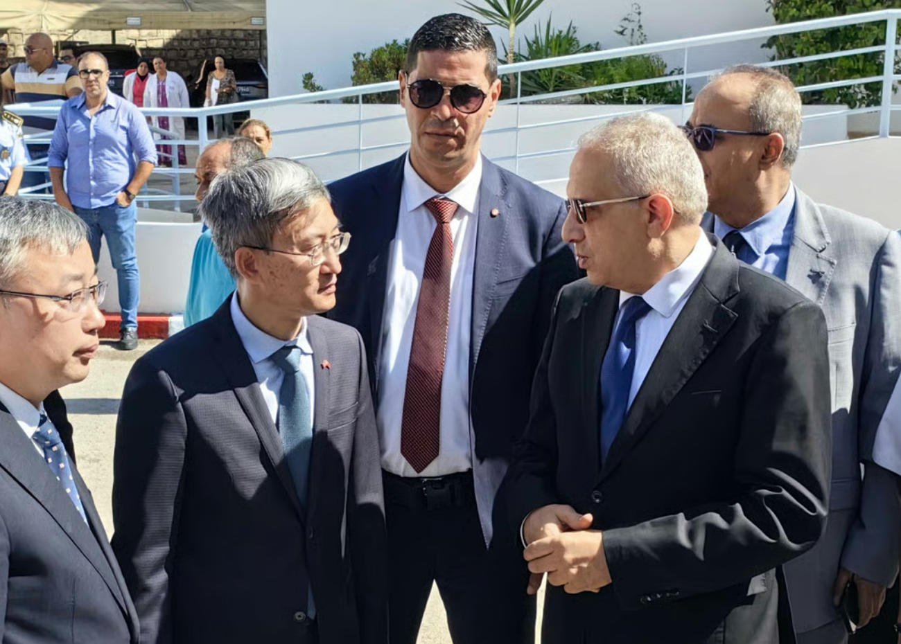 Chinese ambassador to Tunisia Wan Li (second left) with Tunisian Health Minister Mustapha Ferjani (second right) during his February visit to China. Photo: Handout