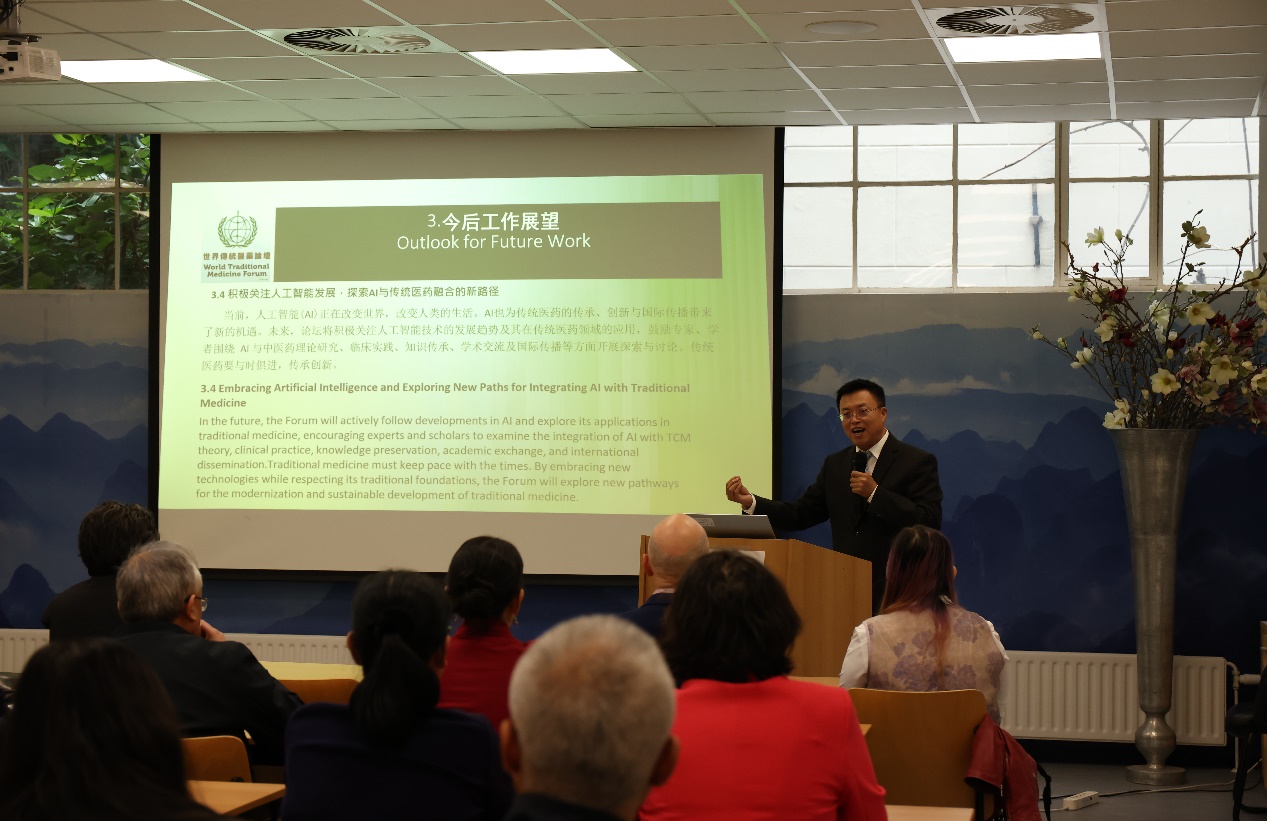 A person standing at podium giving a presentationDescription automatically generated